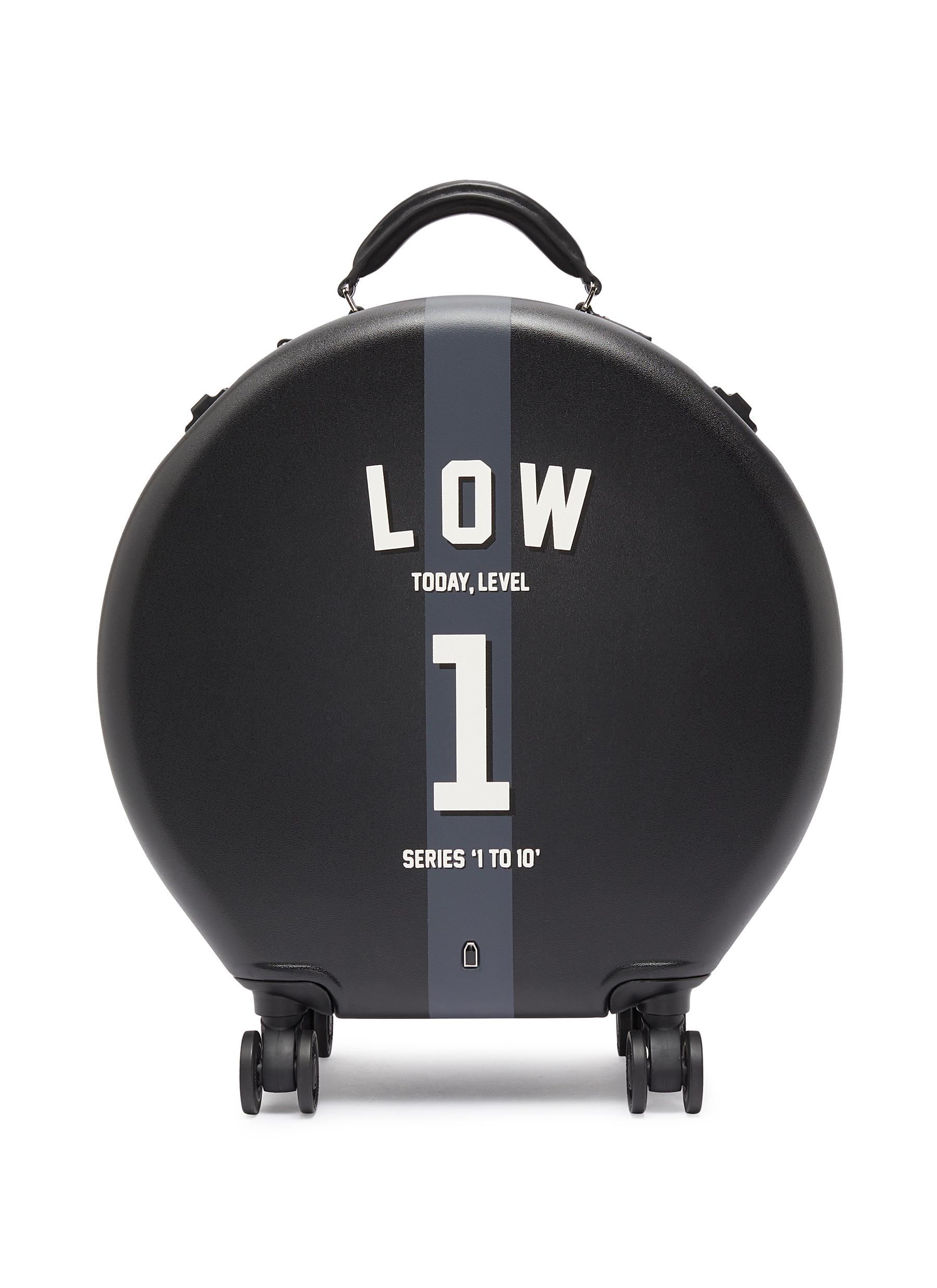 Click to view more detailed imagery on our partner's website Ookonn X Studio Concrete Round Carry-On Spinner Suitcase – 1 Low