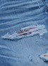  - AMIRI - 夏威夷图案拼贴破洞水洗修身棉质牛仔裤