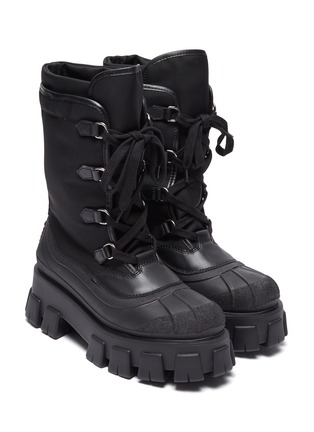 模特儿示范图 - 点击放大 - PRADA - Nylon and leather combat boots