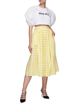 模特儿示范图 - 点击放大 - MIU MIU - LOGO 格纹纯棉中长裙