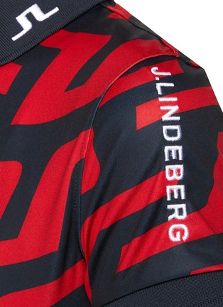  - J.LINDEBERG - ALL OVER LOGO PRINT SHORT SLEEVE POLO SHIRT