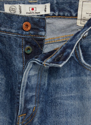  - WASHI - Medium Washed Repaired Jeans