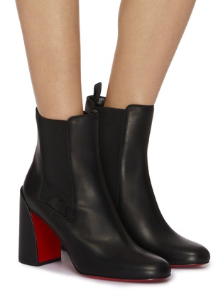 模特儿示范图 - 点击放大 - CHRISTIAN LOUBOUTIN - 85 TURELASTIC 高跟皮革筒靴