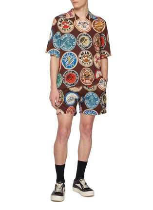 模特儿示范图 - 点击放大 - AMIRI - Amiri Coaster Swim Trunks