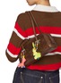 模特儿示范图 - 点击放大 - BUNNY SHAPIRO - Animalito Rabbit Bag Charm — Yellow