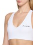 - SPORTY & RICH - Signature Logo V-neck Athletic Bra