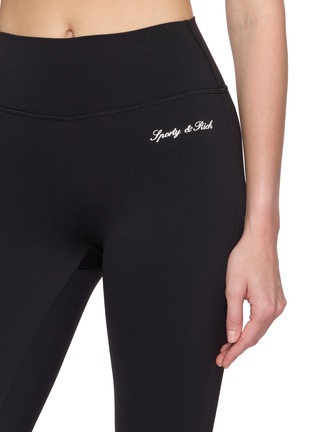  - SPORTY & RICH - Signature Logo Flared Leggings