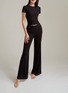 细节 –点击放大 - SILKY MIRACLE - Nude Flared Leg Trousers — Black/Size M
