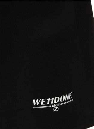  - WE11DONE - 印花毛边运动短裤