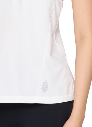  - FP MOVEMENT - Hot Shot Twist Back Tank Top