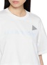  - AND WANDER - Reflective Logo Crewneck Cropped T-Shirt