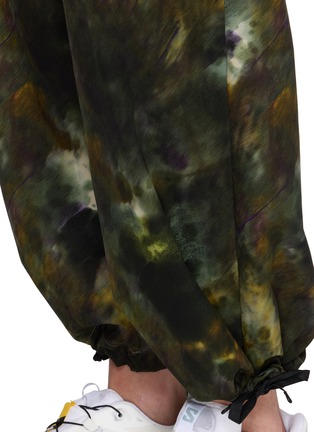  - AND WANDER - X ROA Camouflage Print Pants