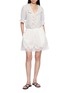 模特儿示范图 - 点击放大 - DÔEN - Henri Striped Ruffle-Trimmed Blouse