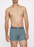 模特儿示范图 - 点击放大 - SKIMS - SKIMS Cotton Boxer Briefs — Pack of 3