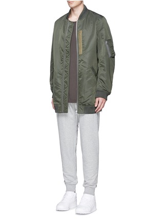 模特示范图 - 点击放大 - NLST - 罗缎装饰长款尼龙夹克